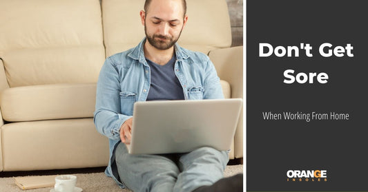 person sitting on the floor while working from home