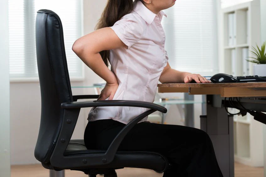 What is the reason for lower back pain?
