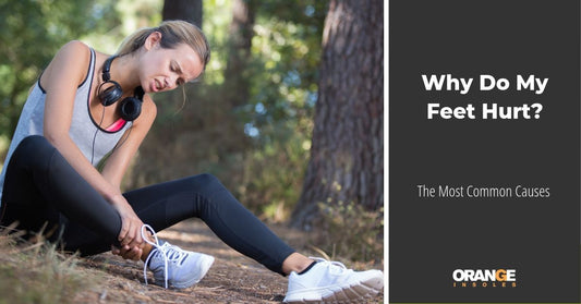 Woman holding sore feet